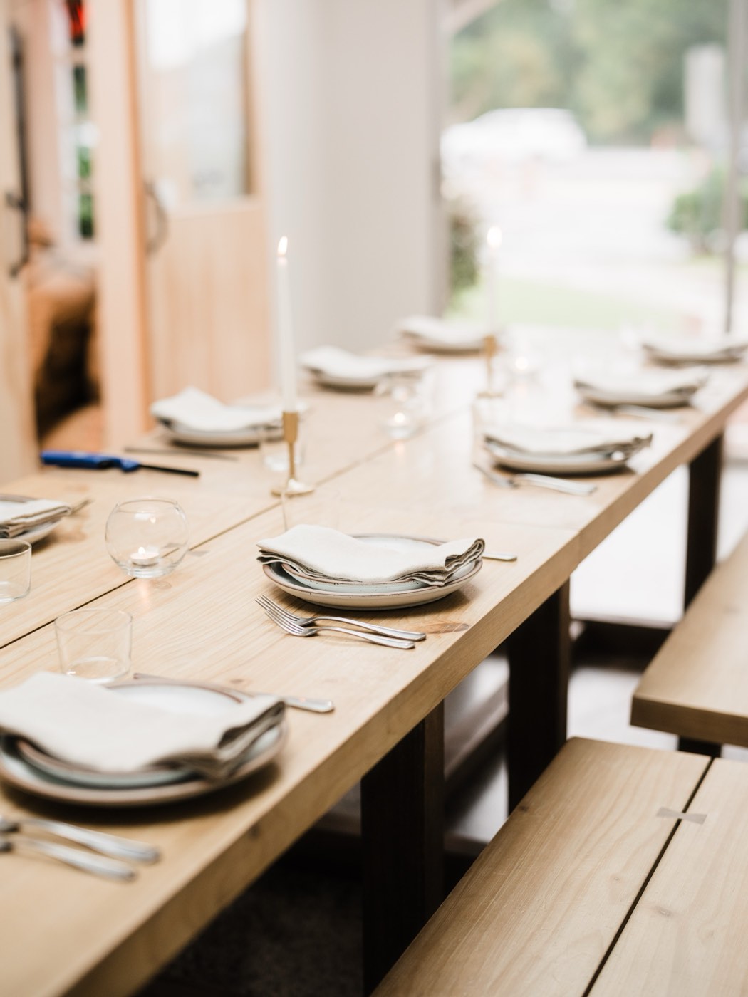 A just-married couple walking back up the aisle to joyful live ceremony music.